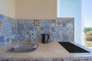 Køkken eller tekøkken på Melus Maris + 32 billeder