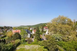 una vista aérea de una localidad con árboles y casas en Fewo Ferber - Vogesen, en Badenweiler