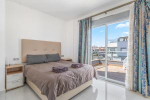 Giường trong phòng chung tại Villa Bahati +16 ảnh