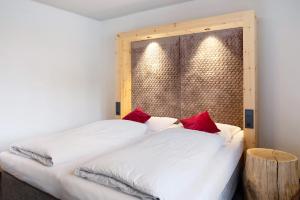 Postel nebo postele na pokoji v ubytování Angerle Alm Apt König Laurin