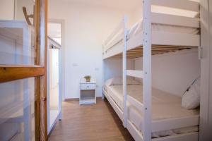 Postel nebo postele na pokoji v ubytování App Porto Rotondo + 18 fotografií