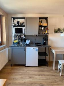 Kuchyň nebo kuchyňský kout v ubytování Hofgut Homboll