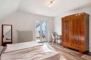 Postel nebo postele na pokoji v ubytování Ferienwohnung am Bach