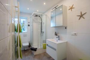 Bilik mandi di Wohnung Lichtentaler Allee +23 gambar