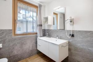 Koupelna v ubytování Chalet Snowlake Appartamento Cielo