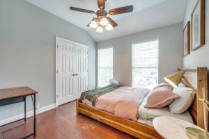 a bedroom with a bed and a ceiling fan at King Bdgame Roomprivate Lake Access in Little Elm