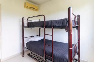 Lliteres en una habitació de Puerta Laguna E002 29 fotos més