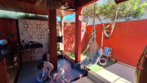an aerial view of a house with a swing at Casa chalé in Itajaí