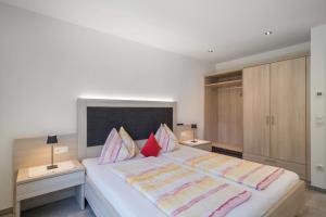 Katil atau katil-katil dalam bilik di Weinreichhof Apartment Laaser Spitz