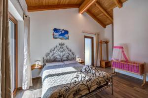 Postel nebo postele na pokoji v ubytování Il Girasole Bed and Breakfast