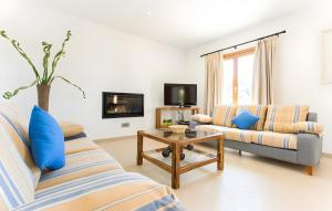 a living room with two couches and a coffee table at Pula Bonavista Ref 140 in Costa des Pins