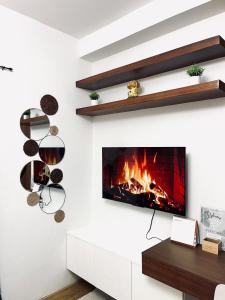 TV a/nebo společenská místnost v ubytování Chic Studio in Mesatierra