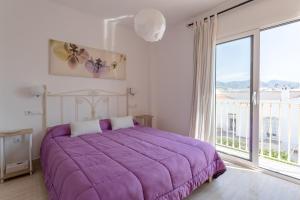 Postel nebo postele na pokoji v ubytování Apartamento Corazón de Nerja