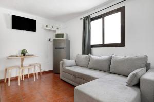 a living room with a couch and a table at Casa Diego in Soo