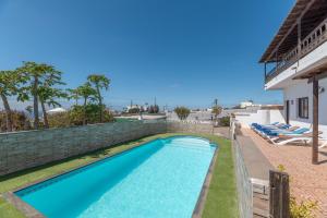 Bazén v ubytování Andres House, Tías nebo v jeho okolí