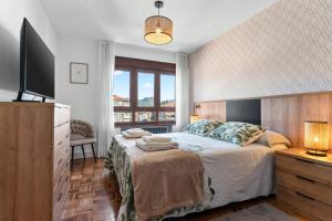 Postel nebo postele na pokoji v ubytování Comarca del Sella