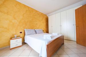 Postel nebo postele na pokoji v ubytování Casetta Bella