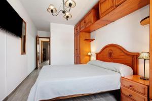 Ένα ή περισσότερα κρεβάτια σε δωμάτιο στο Apartamento Luha