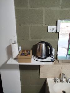 Η κουζίνα ή μικρή κουζίνα στο Habitación para 3