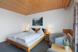 Ένα ή περισσότερα κρεβάτια σε δωμάτιο στο Pension Birgit +86 φωτογραφίες