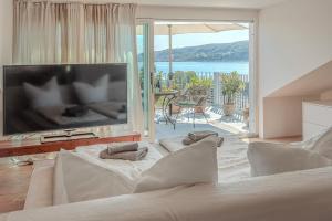 Μια τηλεόραση ή/και κέντρο ψυχαγωγίας στο Seeapartment Untersee