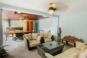 A seating area at La Concordia - Boutique Hotel