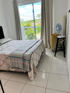 Ένα ή περισσότερα κρεβάτια σε δωμάτιο στο Casa praia pontal próx embarque ilha do mel +25 φωτογραφίες