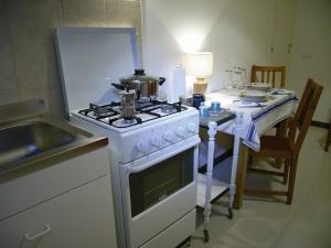 A kitchen or kitchenette at A un Passo dai Sassi