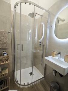 a bathroom with a shower and a sink at Da Nonno Mario in Bagnoli Irpino +16 photos