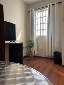 TV a/nebo společenská místnost v ubytování habitacion Cerezo + 1 fotografie