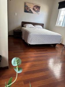 Postel nebo postele na pokoji v ubytování habitacion Cerezo