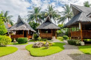 Pura Vida Beach & Dive Resort, Dauin (güncel 2026 fiyatları)