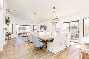 a dining room with a table and chairs at Western Hills-Heated Pool-In Fountain Hills in Fountain Hills