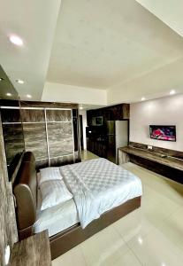 Ένα ή περισσότερα κρεβάτια σε δωμάτιο στο Nagoya Mansion Residence with City View +17 φωτογραφίες