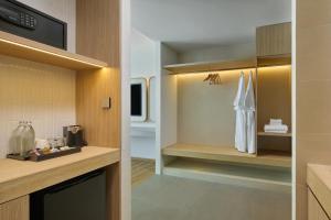 Η κουζίνα ή μικρή κουζίνα στο Phetara Hotel Mahachai by PCL