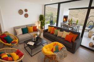 Coin salon dans l'établissement Casas Rurales Mirador Jorquera