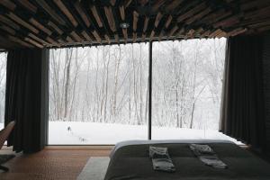 Katil atau katil-katil dalam bilik di SNOW PEAK FIELD SUITE SPA HEADQUARTERS