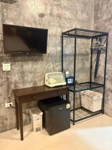 TV a/nebo společenská místnost v ubytování Lanta Feelgood Long beach resort