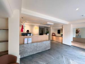 a lobby of a hospital with a waiting room at SH Hotel in Phnom Penh