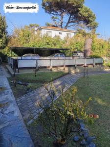 Zahrada ubytování Complejo Departamentos Vilalen + 22 fotografií