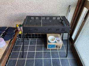 Ένα ή περισσότερα κρεβάτια σε δωμάτιο στο BlueTree稲取