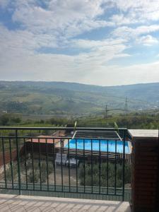 a view of a swimming pool from a house at I luoghi di Lisetta in Montefusco