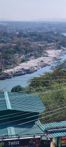 an aerial view of a river and a beach at Hotel shivansh Residency in Rishīkesh