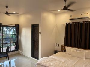 Postel nebo postele na pokoji v ubytování Danny's Guest House