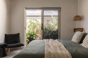 En eller flere senge i et værelse på Carmine + 4 billeder