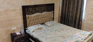 Ένα ή περισσότερα κρεβάτια σε δωμάτιο στο Hotel O Shere E Punjab