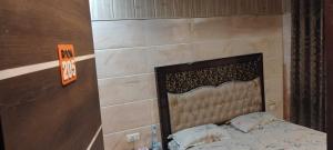 Ένα ή περισσότερα κρεβάτια σε δωμάτιο στο Hotel O Shere E Punjab