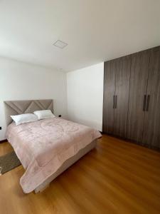 Postel nebo postele na pokoji v ubytování Casa Comoda