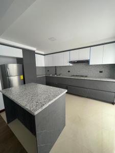 Kuchyň nebo kuchyňský kout v ubytování Casa Comoda