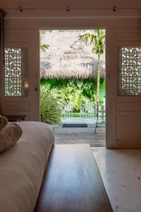 Postel nebo postele na pokoji v ubytování Sanae Beach Hua Hin